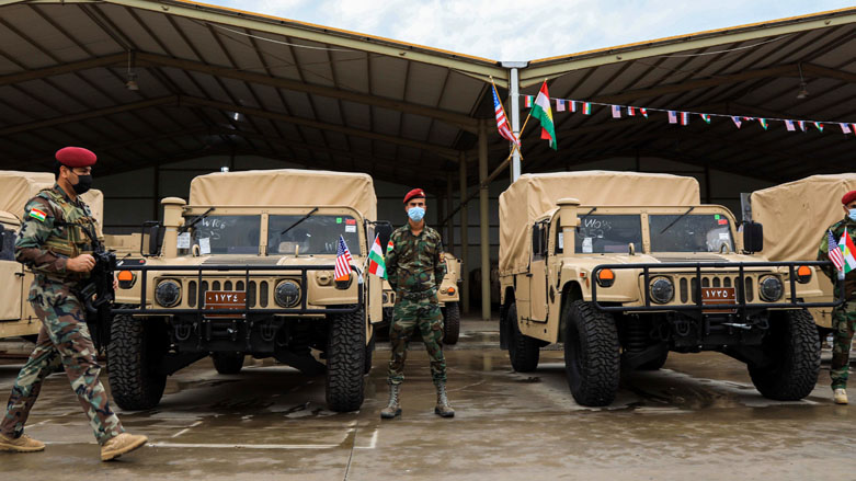 Members of the Peshmerga forces during a ceremony in which US forces donated military vehicles to the Kurdish forces in Erbil, Nov. 10, 2020. (Photo: Safin Hamed / AFP)
